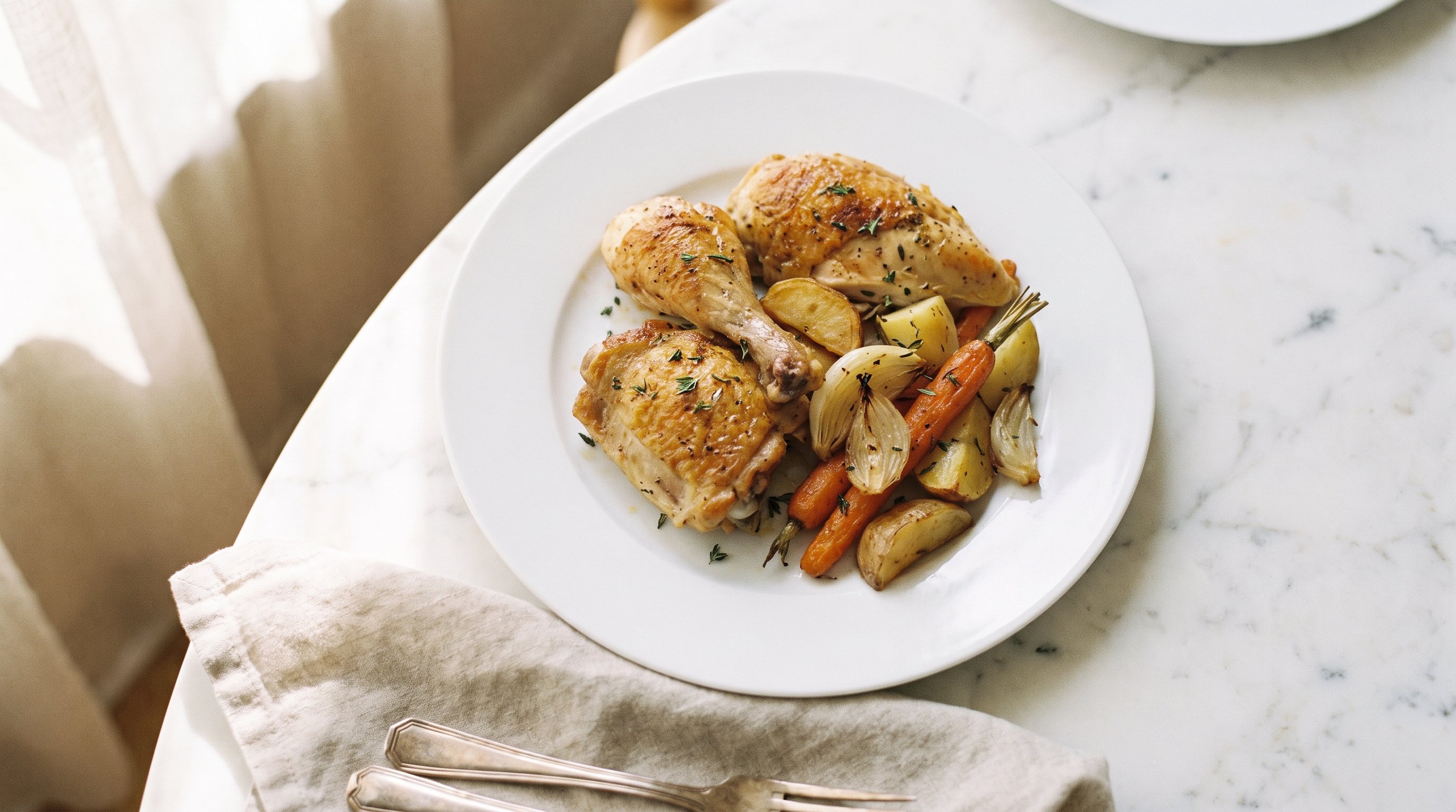 chopped vegetables and chicken pieces on a cutting board