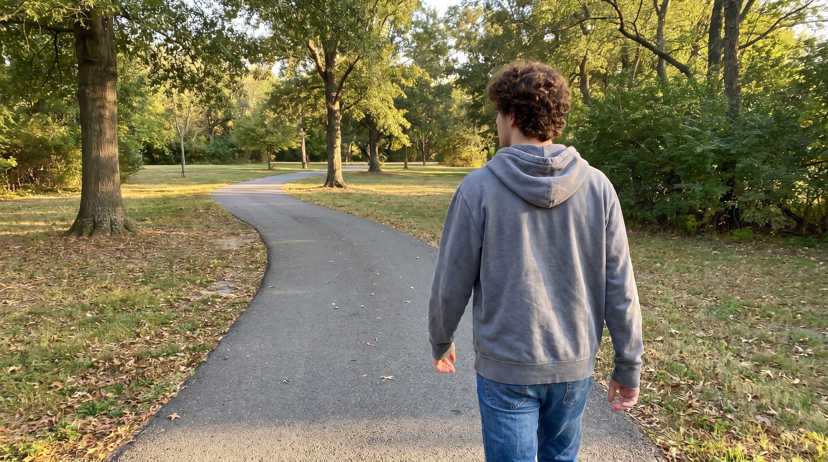 person stepping outside for a short walk instead of checking their phone