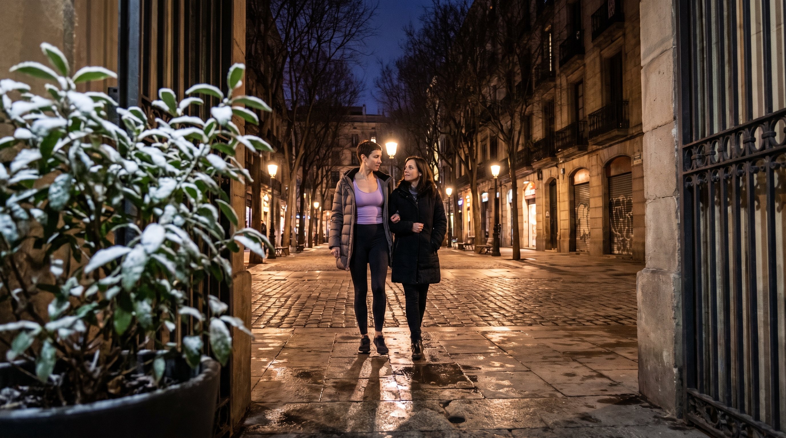 two friends laughing together while walking outdoors